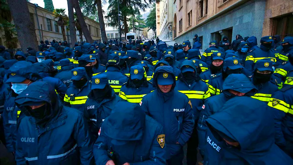 Police block off a street to prevent demonstrators from holding a rally in front of parliament. The demonstrators are protesting against the government's decision to suspend negotiations on accession to the European Union and accuse Georgian Dream of manipulating the vote. Photo: Zurab Tsertsvadze/AP/dpa