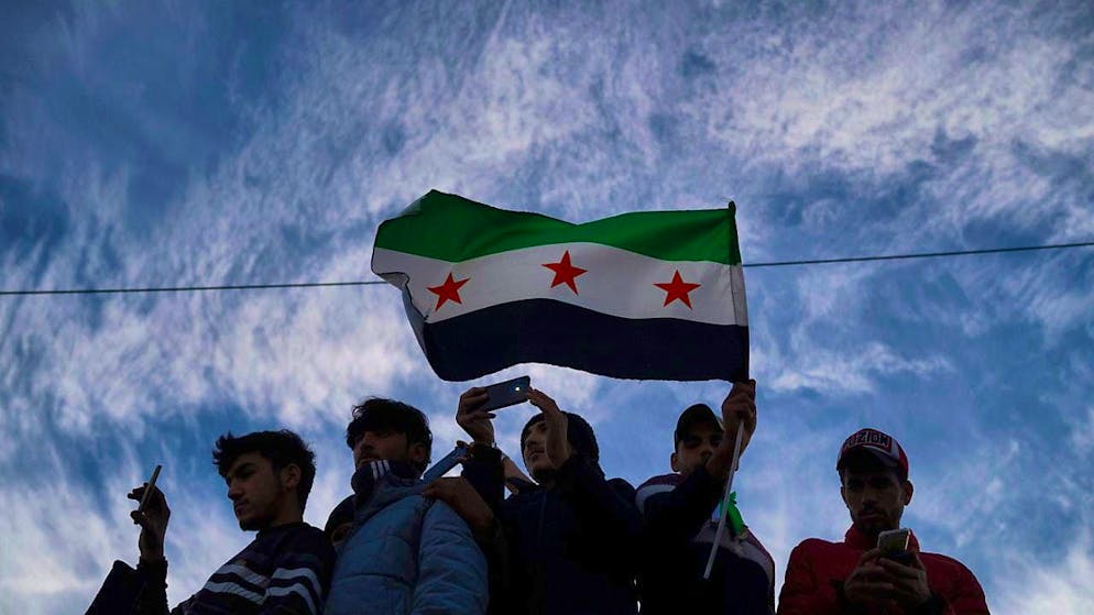 ARCHIVE - Syrians gather in Umayyad Square days after the fall of Bashar Assad's government. Photo: Leo Correa/AP/dpa