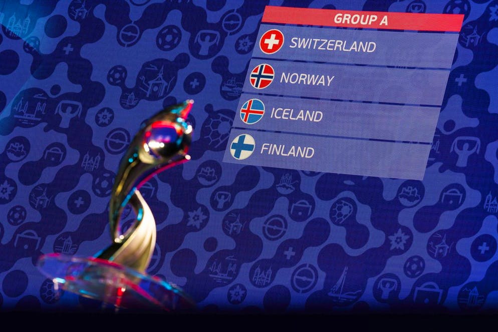 epa11781333 Group A that includes Switzerland, Norway, Iceland and Finland is displayed with the trophy after the UEFA Women's EURO 2025 final draw, in Lausanne, Switzerland, 16 December 2024. The UEFA Women's Euro 2025 tournament will be played in Switzerland from 02 to 27 July 2025. EPA/VALENTIN FLAURAUD