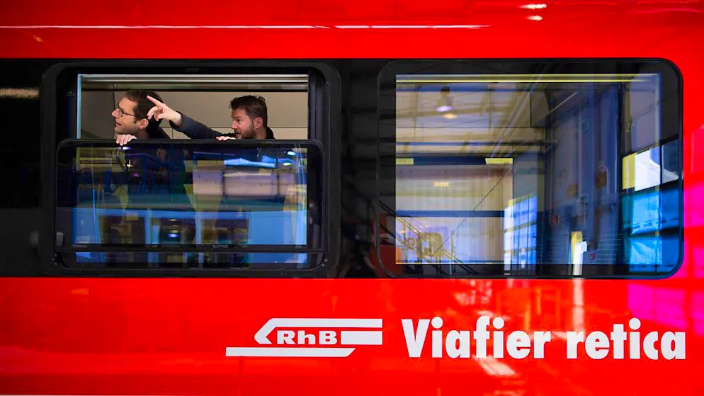 Rail enthusiasts in the new Stadler "Capricorn" multiple-unit train of the Rhaetian Railway. The narrow-gauge railroad is renewing its fleet with a total of 62 trains of this type.