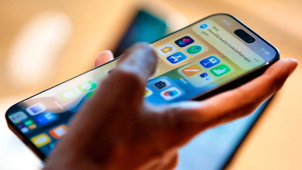 The EU Commission is urging Apple to open up the iPhone even more to rivals. (archive picture)