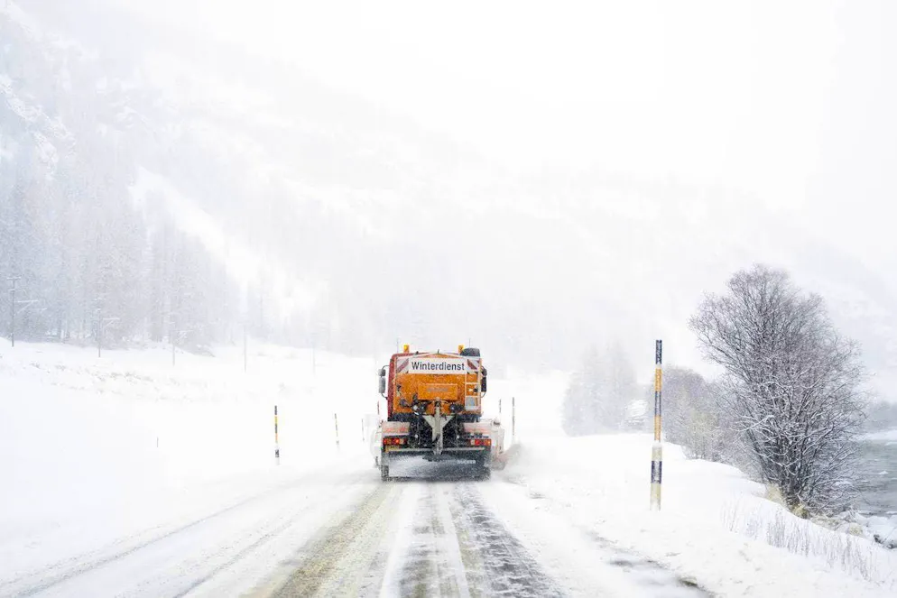 A winter service truck clears snow from the road. December saw high levels of precipitation in many places in Switzerland.