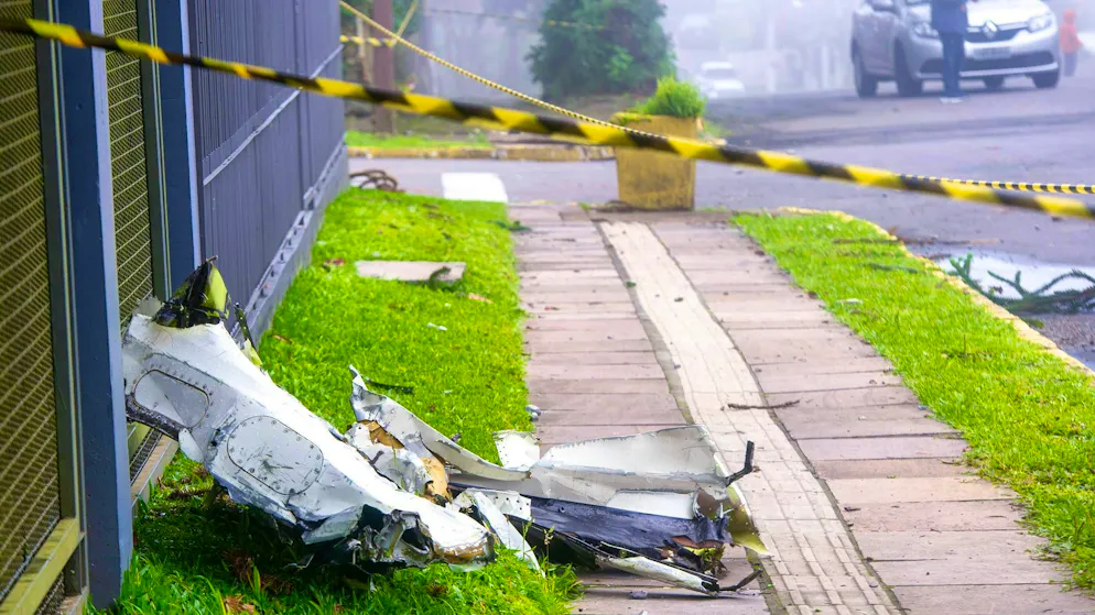 Small plane crashes in Brazil - ten people dead - Gallery. Debris lies at the site of a small plane crash in a Brazilian city.