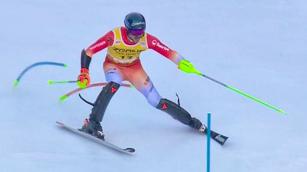 Rochat runs over a slalom pole, which then hits him in a sensitive spot.