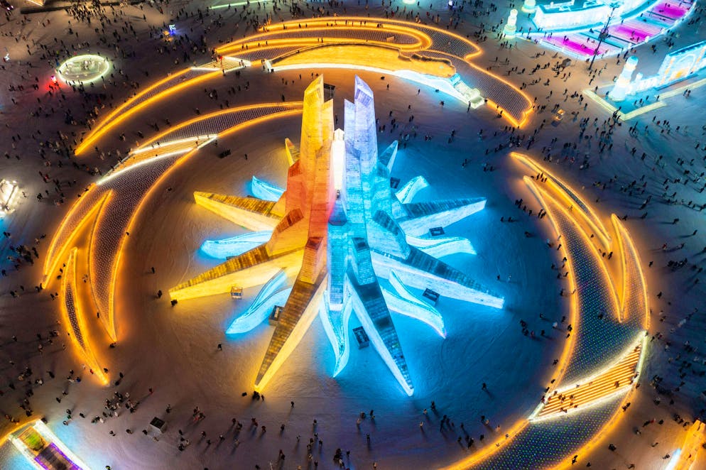 Harbin International Ice and Snow Sculpture Festival: at night, the huge buildings and sculptures are colorfully illuminated.