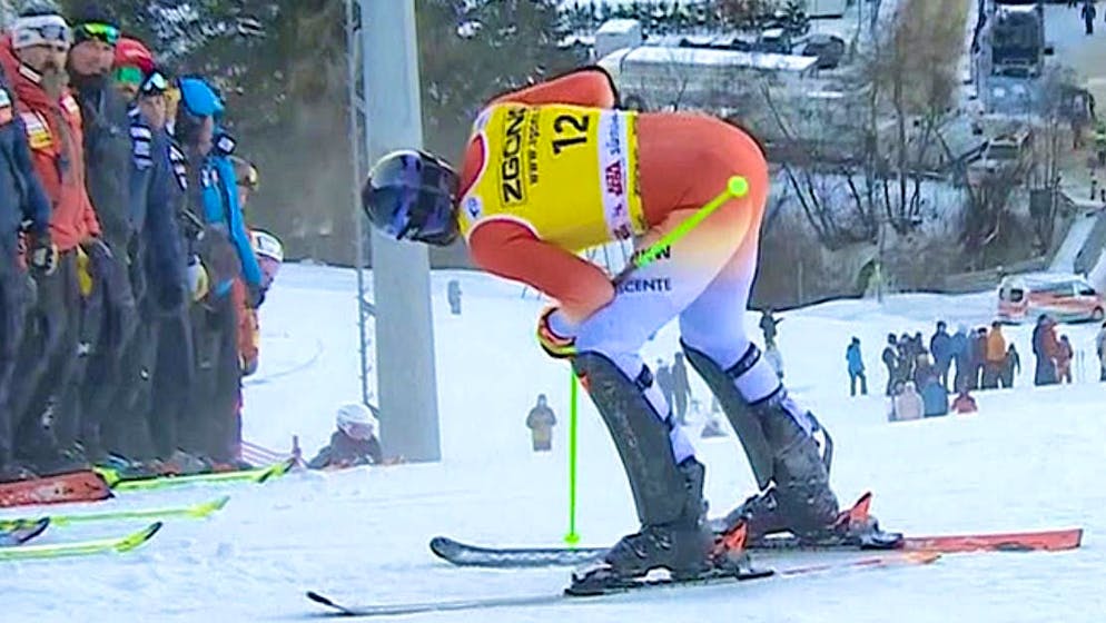 That hurt: Rochat writhes in pain under the eyes of some coaches after his retirement.