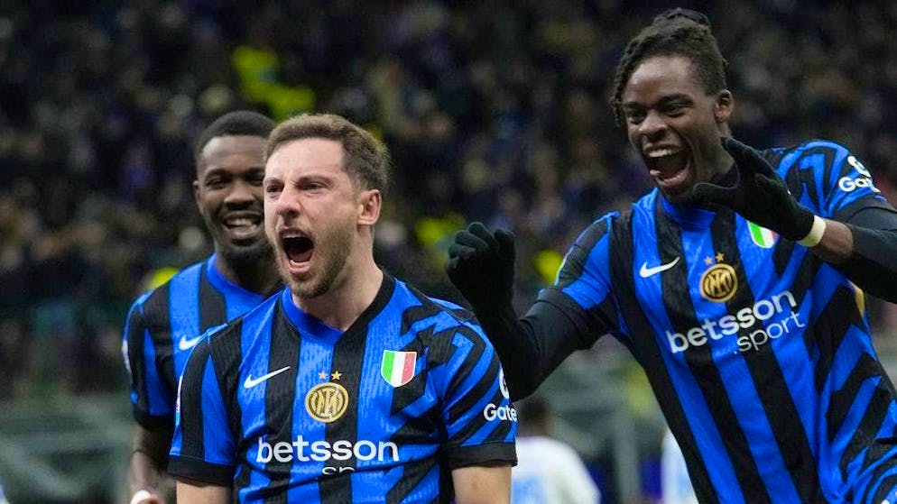 Carlos Augusto (front) put Inter on course for victory.