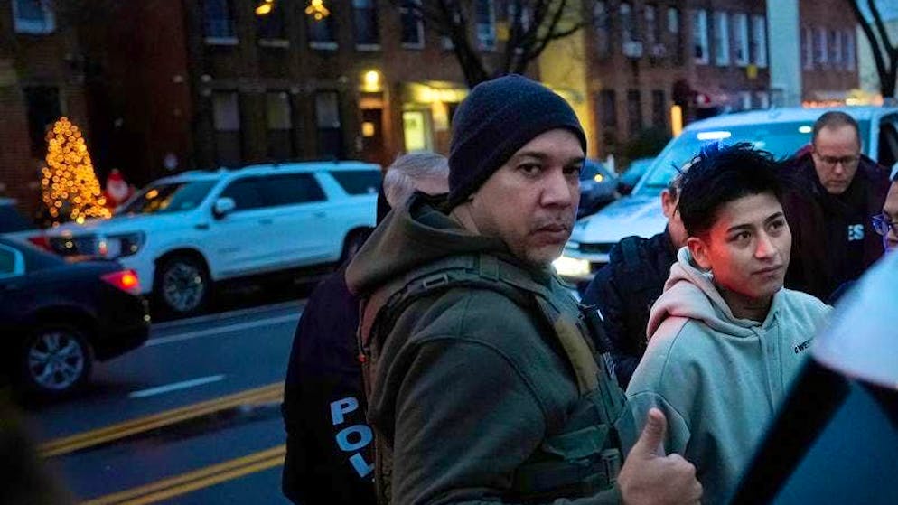 Deportation officers from the "Enforcement and Removal Operations" division of the US Immigration and Customs Enforcement agency on duty in New York City.