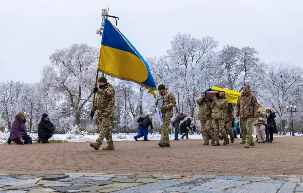Comrades carry the coffin of Petro Velykiy during the funeral of the 48-year-old actor, who was killed in a battle with Russian troops in the Kursk region.