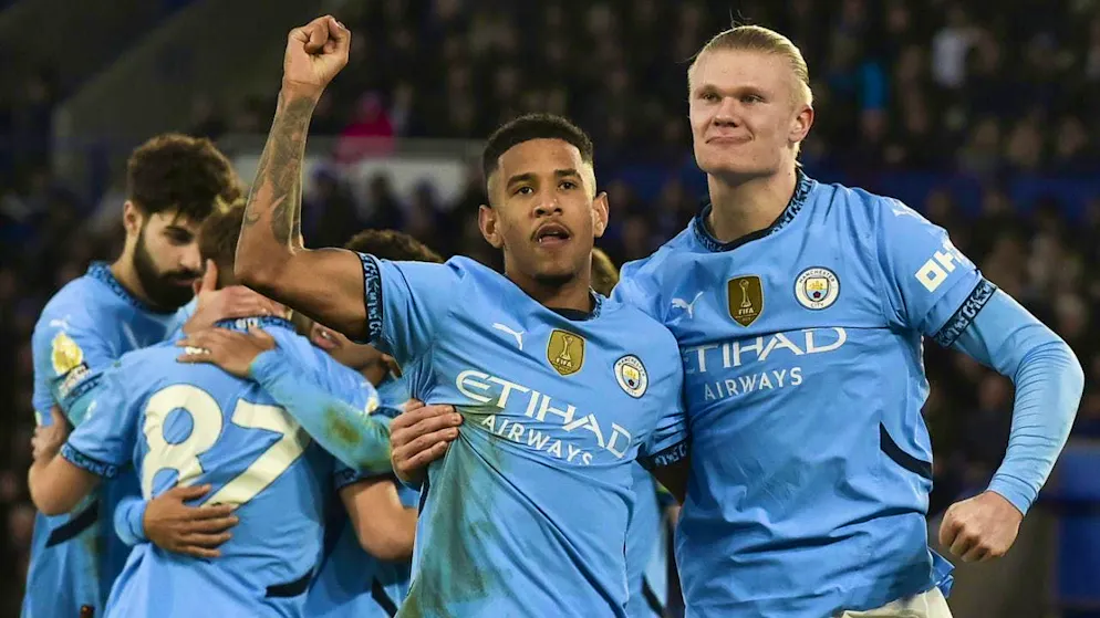 Savinho and Erling Haaland (right) score City's goals at Leicester