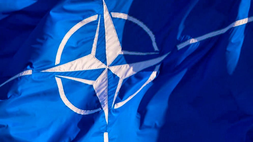 ARCHIVE - A NATO flag flies at a meeting of NATO foreign ministers. Photo: Daniel Naupold/dpa
