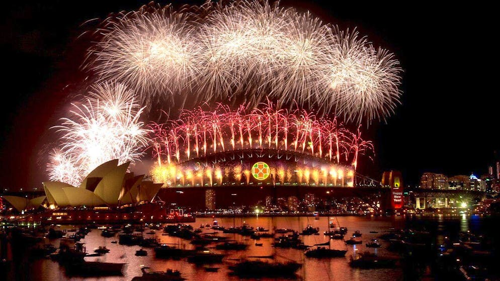 Against the backdrop of the Harbour Bridge and the iconic Opera House, mega fireworks light up the night sky in Sydney every New Year's Eve. (archive picture)