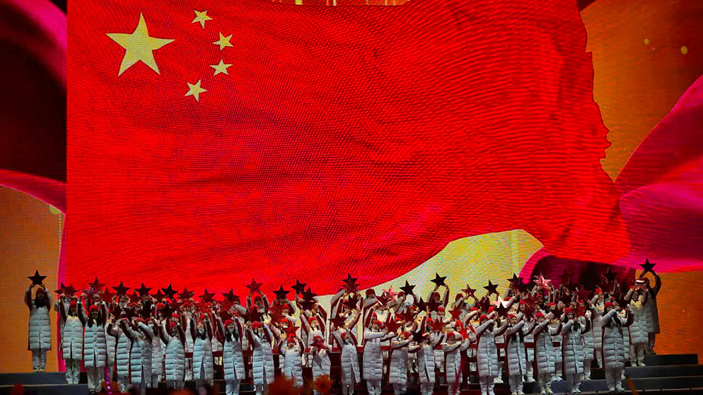 Darsteller während einer Countdown-Veranstaltung in Peking. Foto: Ng Han Guan/AP/dpa