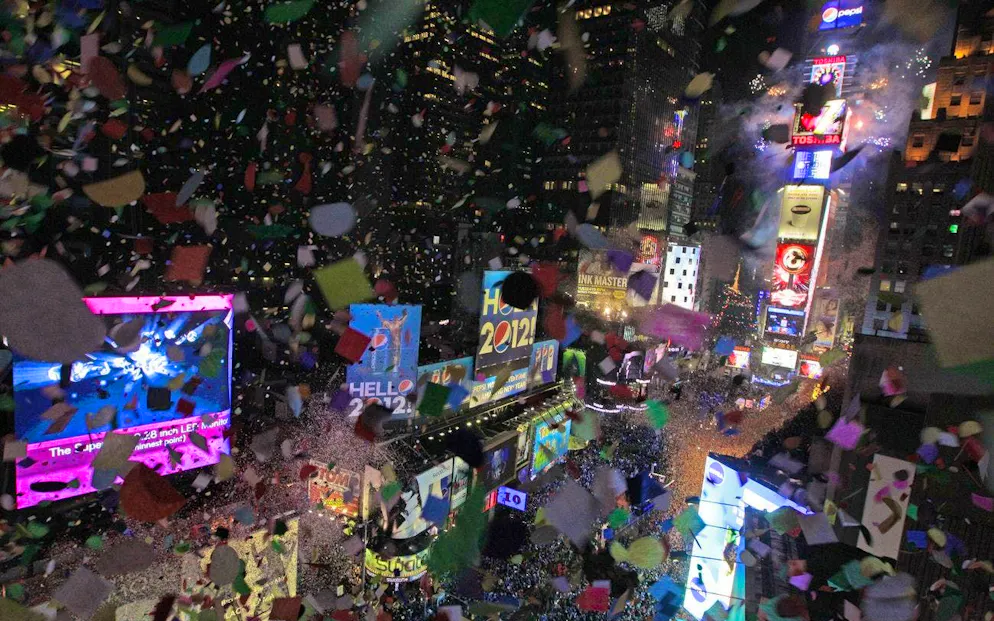When the clock strikes midnight, there is no better place for many than New York's Times Square. Here it rains good intentions and confetti.