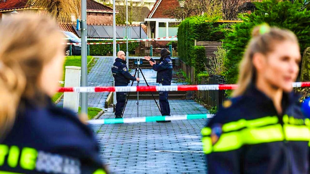 Police investigate a crime scene in Rotterdam. Photo: JEFFREY GROENEWEG/ANP/dpa