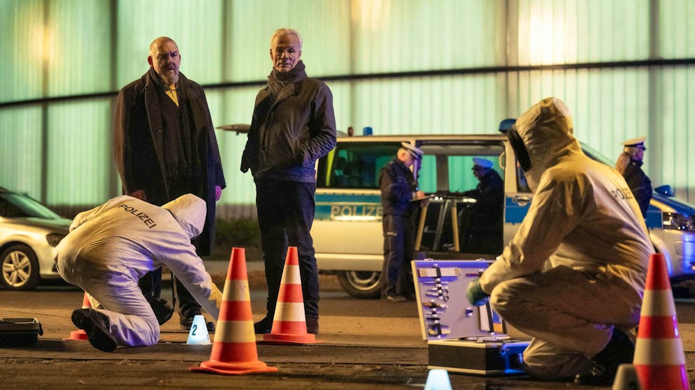 What to do when you're in over your head with debt?. Freddy Schenk (Dietmar Bär, left) and Max Ballauf (Klaus J. Behrendt) don't find a corpse at the crime scene this time, just traces of blood from debt collection manager Fabian Pavlou.