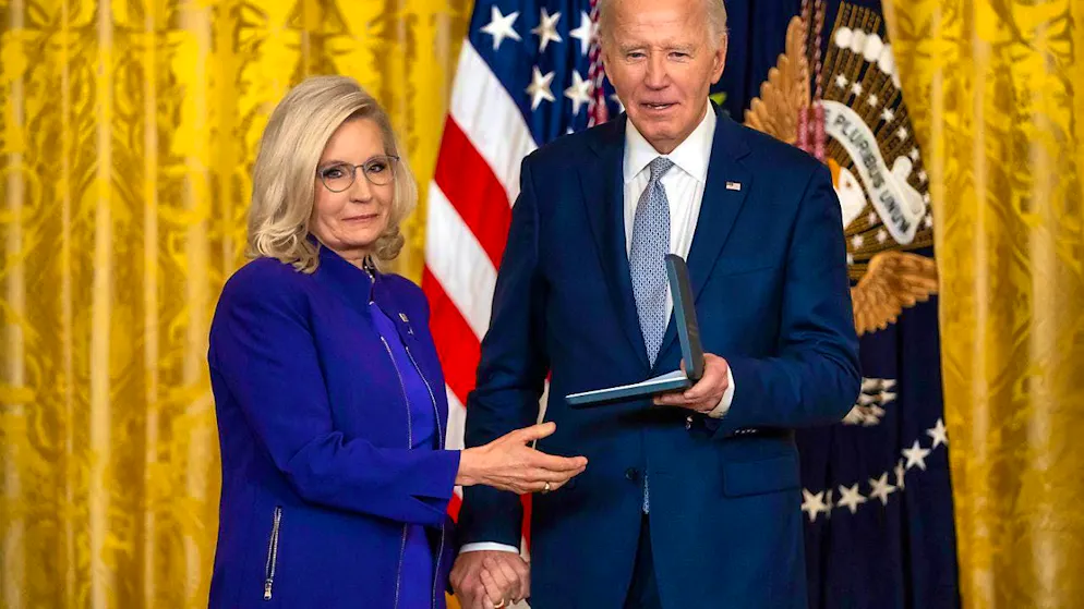 US President Joe Biden awards the Presidential Citizens Medal to former Congresswoman Liz Cheney during a ceremony in the East Room of the White House. Photo: Mark Schiefelbein/AP/dpa