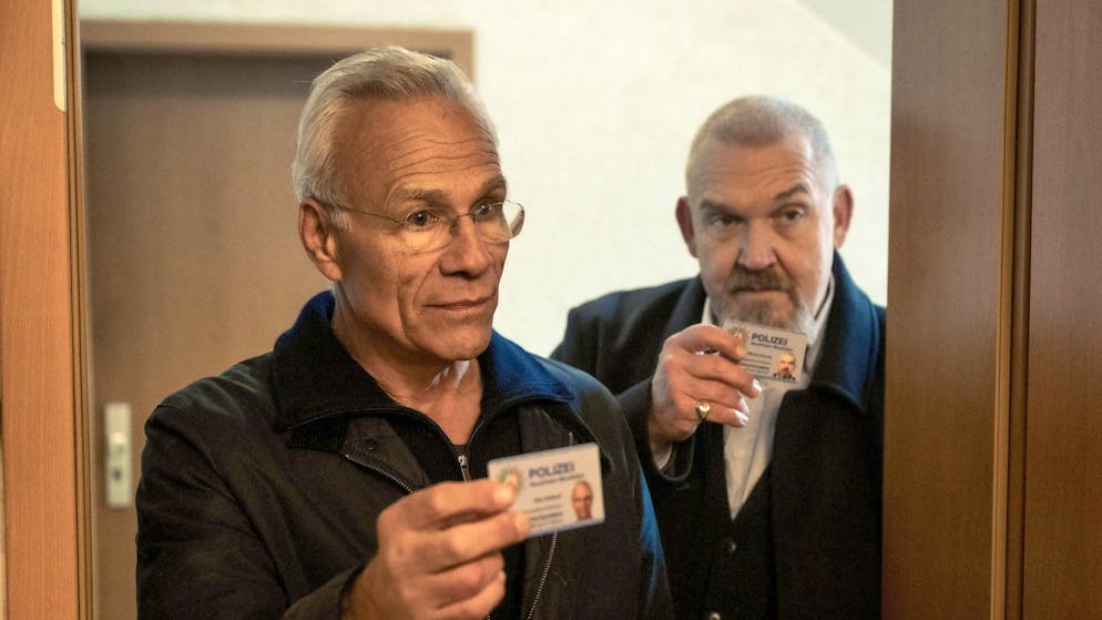 What to do when you're in over your head with debt?. Max Ballauf (Klaus J. Behrendt, left) and Freddy Schenk (Dietmar Bär) visit the customers of a debt collection manager in "Tatort: Restschuld".