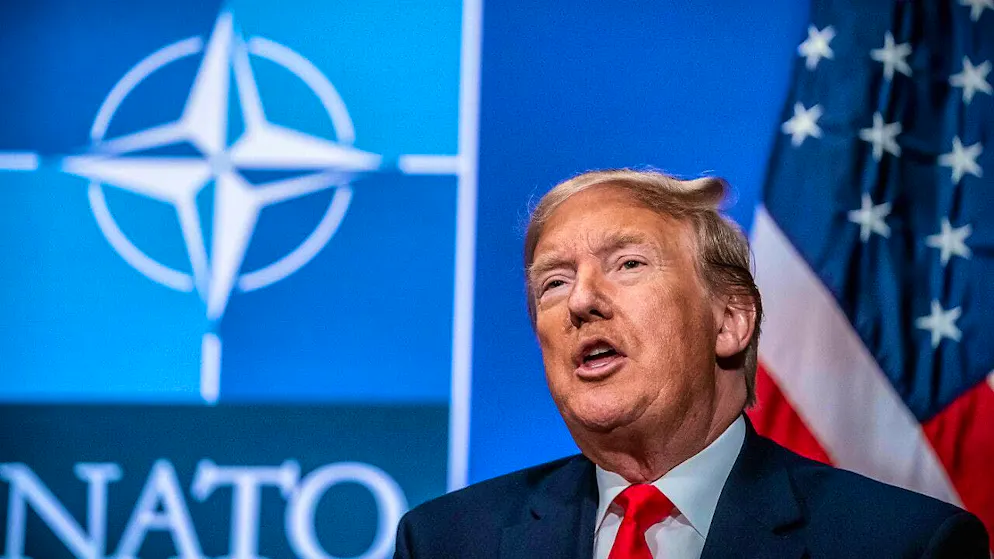 ARCHIVE - US President-elect Donald Trump in front of the NATO logo. Photo: Michael Kappeler/dpa