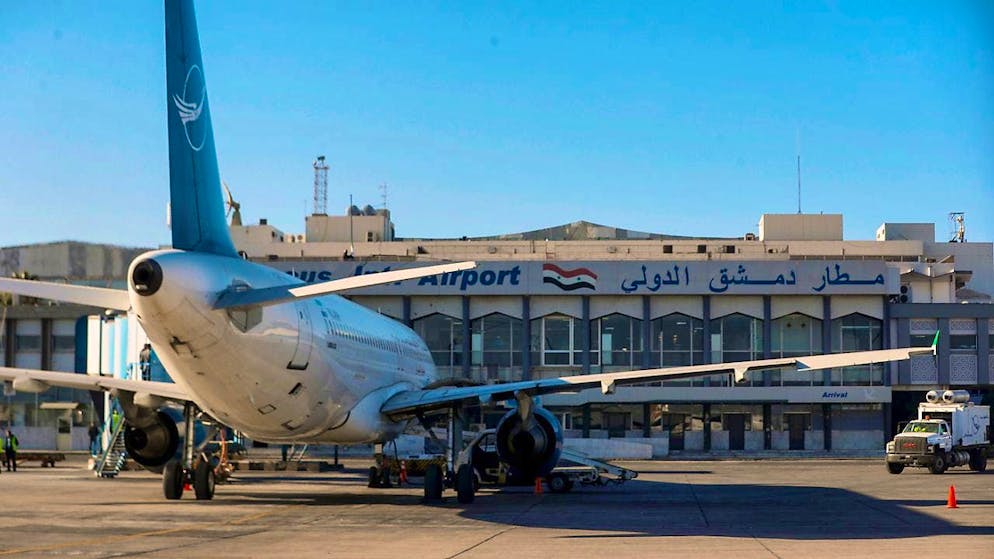 ARCHIVE - A Syrian Air plane parks at the terminal as the airport in Damascus reopens for internal flights. Photo: Omar Sanadiki/AP/dpa/Archive image