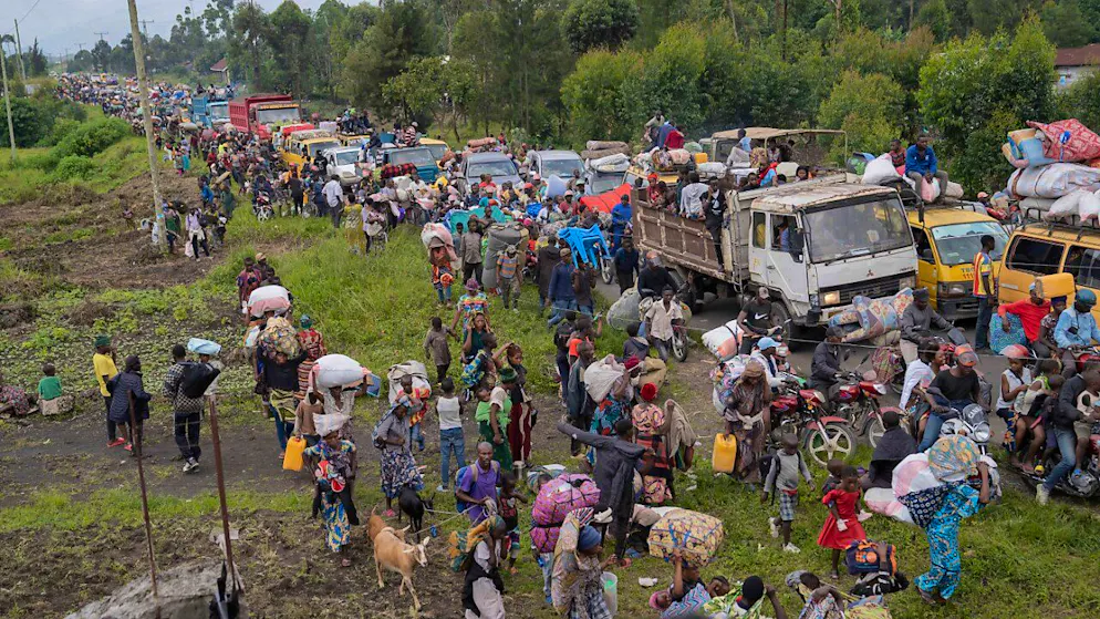 ARCHIV - Menschen fliehen vor dem anhaltenden Konflikt zwischen Regierungstruppen und M-23-Rebellen in der ostkongolesischen Provinz Nord-Kivu. Foto: Moses Sawasawa/AP/dpa