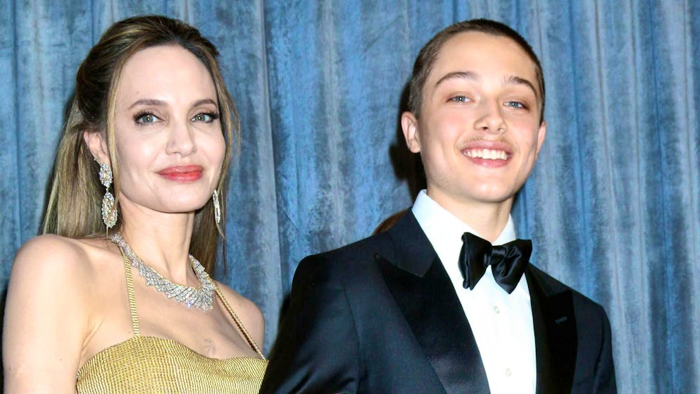 Angelina Jolie and her son Knox have loaded up their SUV with food to help the victims of the fire. The actress offers some people shelter in her home.