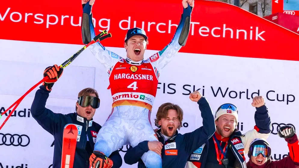 Norway's Fredrik Möller is celebrated by his teammates after his super-G triumph in Bormio