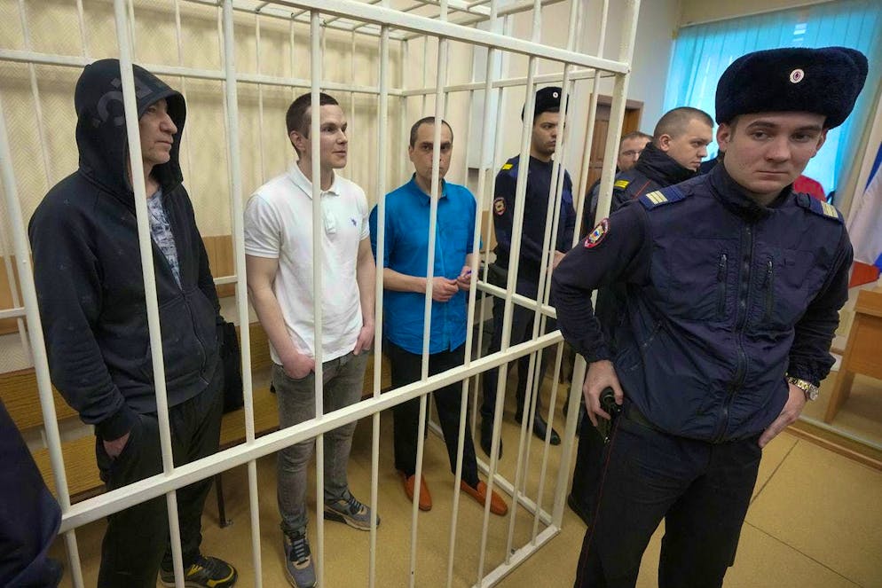 Navalny's lawyers Igor Sergunin, Alexei Lipzer and Vadim Kobsev (from left) in court in Petushki on January 17.