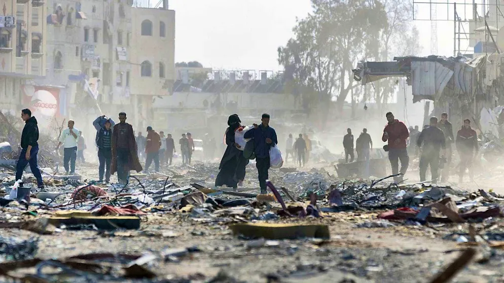dpatopbilder - Palestinian citizens inspect their destroyed homes in the town of Rafah, south of the Gaza Strip, after the ceasefire between Israel and Hamas came into effect. Photo: Saher Alghorra/ZUMA Press Wire/dpa
