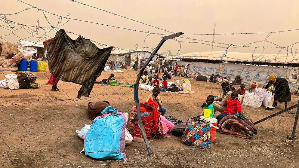 ARCHIVE - Refugees wait to continue their journey to the southern Sudanese border town of Renk. According to the UN, the power struggle in Sudan has triggered the world's largest refugee crisis with more than twelve million refugees. For months, the conflicting parties have been fighting for control of the North Darfur region. Photo: Eva-Maria Krafczyk/dpa