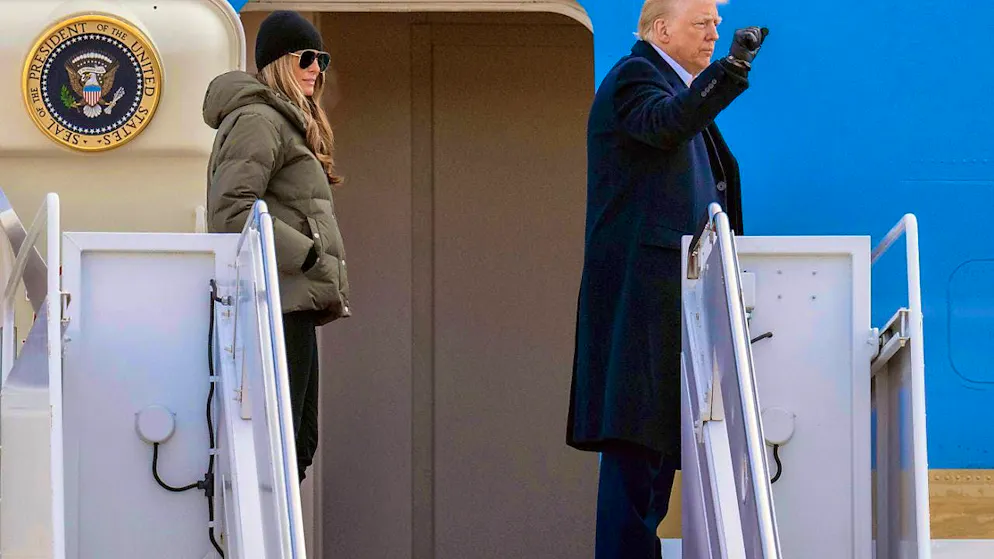 US President Donald Trump and First Lady Melania Trump board Air Force One at Joint Base Andrews for a trip to North Carolina and California. Photo: Jess Rapfogel/AP/dpa