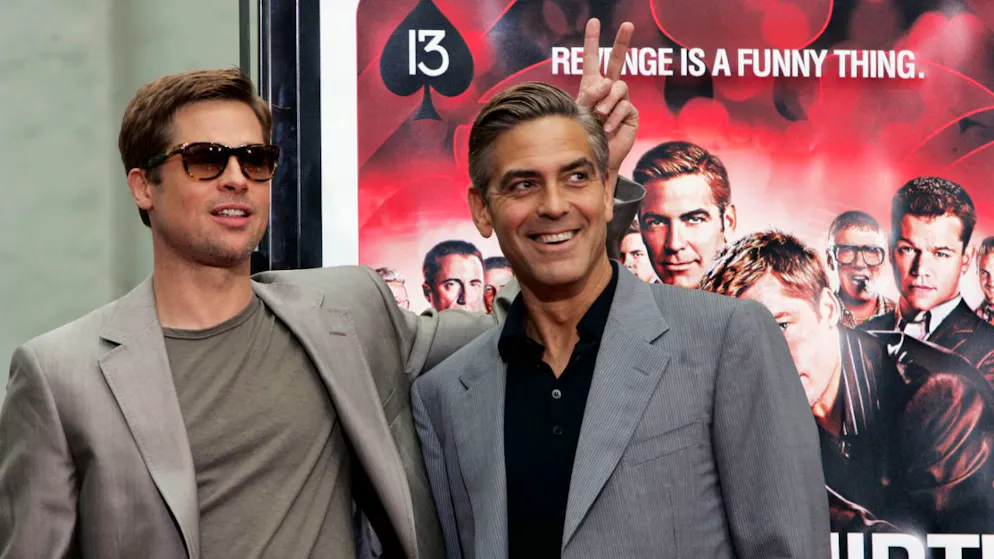 Brad Pitt e George Clooney durante la promozione del film "Ocean's 13"