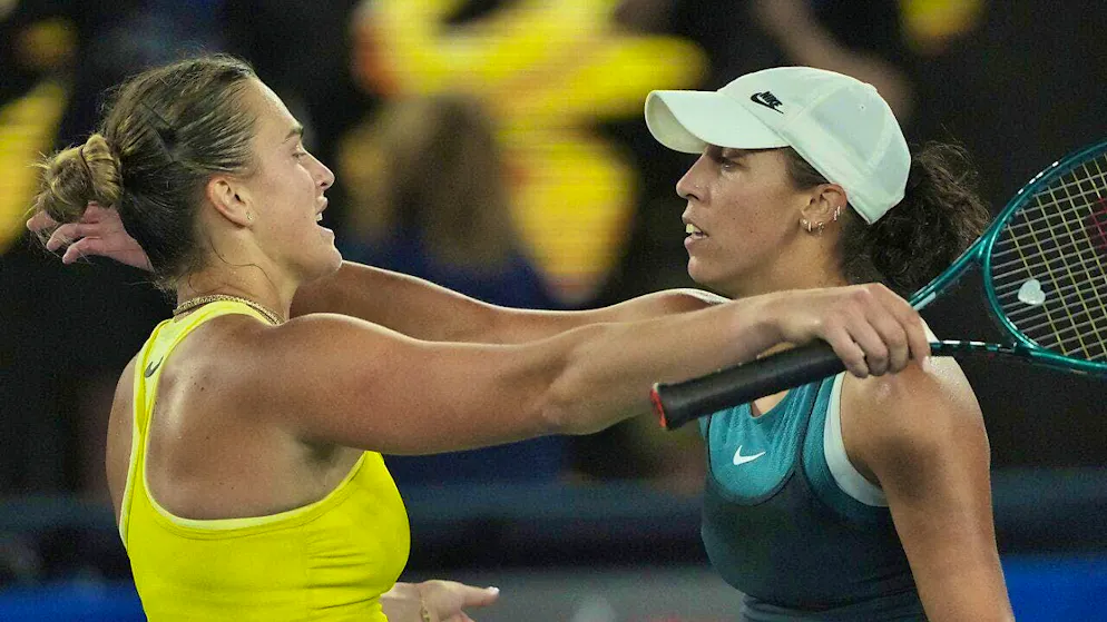 Madison Keys (right) is congratulated on her victory by Aryna Sabalenka