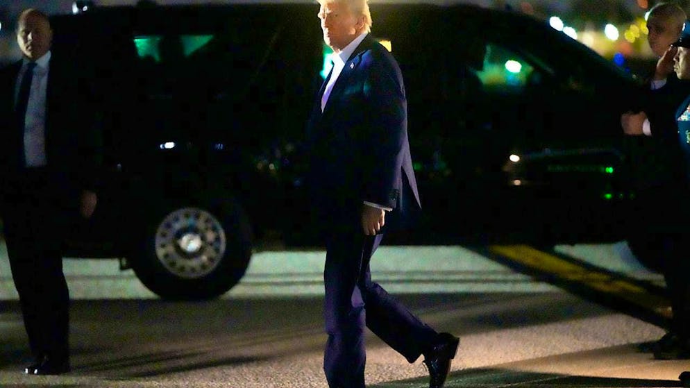US President Donald Trump leaves Air Force One at Miami International Airport after a flight from Las Vegas. Photo: Mark Schiefelbein/AP/dpa