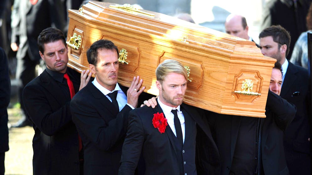 New documentary with emotional insight. Boyzone stars slept next to their late friend's coffin