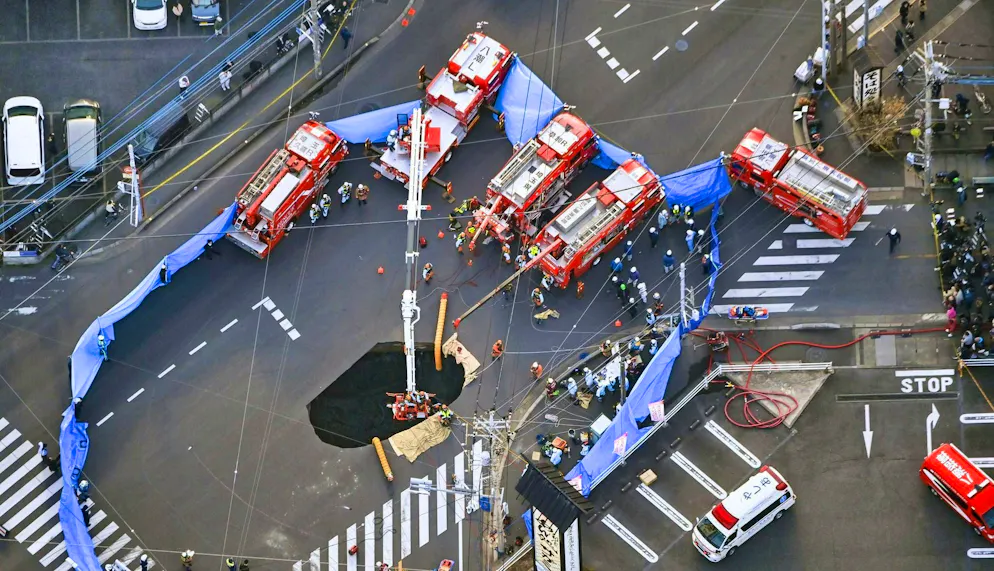 Hole in ground swallows truck at intersection near Tokyo - Gallery. The road collapsed in the middle of an intersection in Japan.