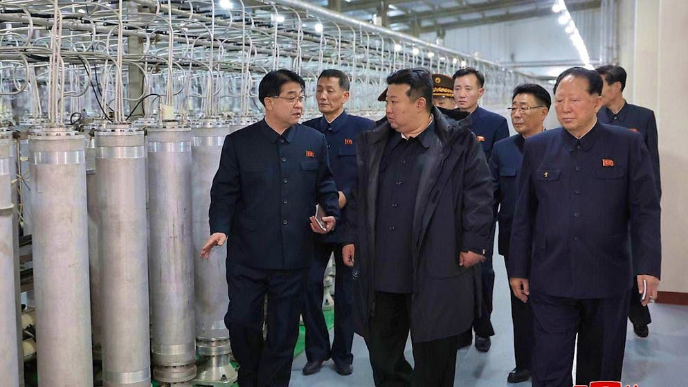 HANDOUT - This undated photo provided by North Korea's state news agency KCNA on Jan. 29, 2025 shows Kim Jong Un (M), North Korea's ruler, touring a nuclear material production facility at an undisclosed location, according to KCNA. Independent journalists did not have access to the event, which can be seen in this picture distributed by the North Korean government. The content of this image is as provided and cannot be independently verified. The watermark in Korean on the image reads as stated by the source: "KCNA" is the abbreviation for Korean Central News Agency. Photo: Uncredited/KCNA/KNS/dpa - ATTENTION: For editorial use only and only with full attribution of the above credit