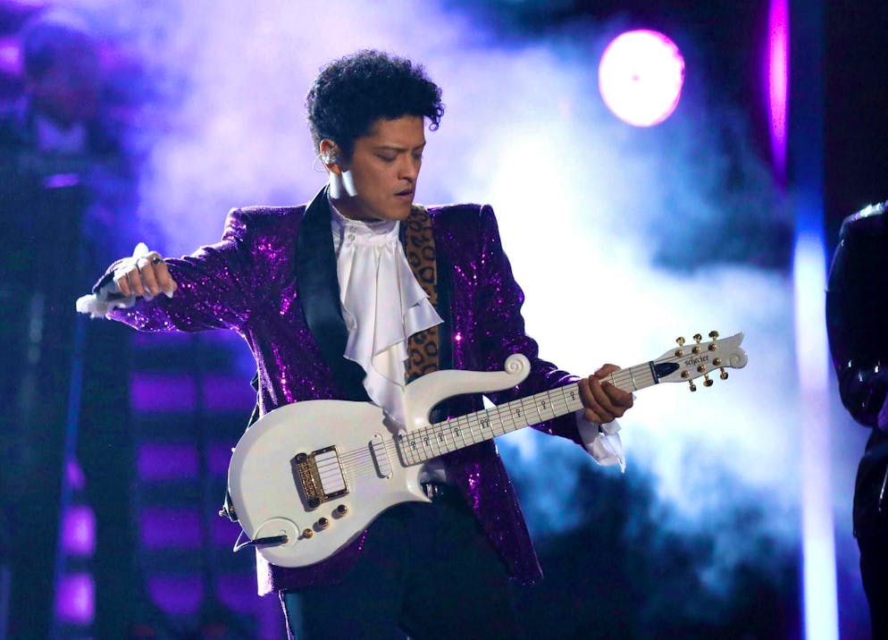 An insider claims to know that musician Bruno Mars owes 50 million dollars in gambling debts.