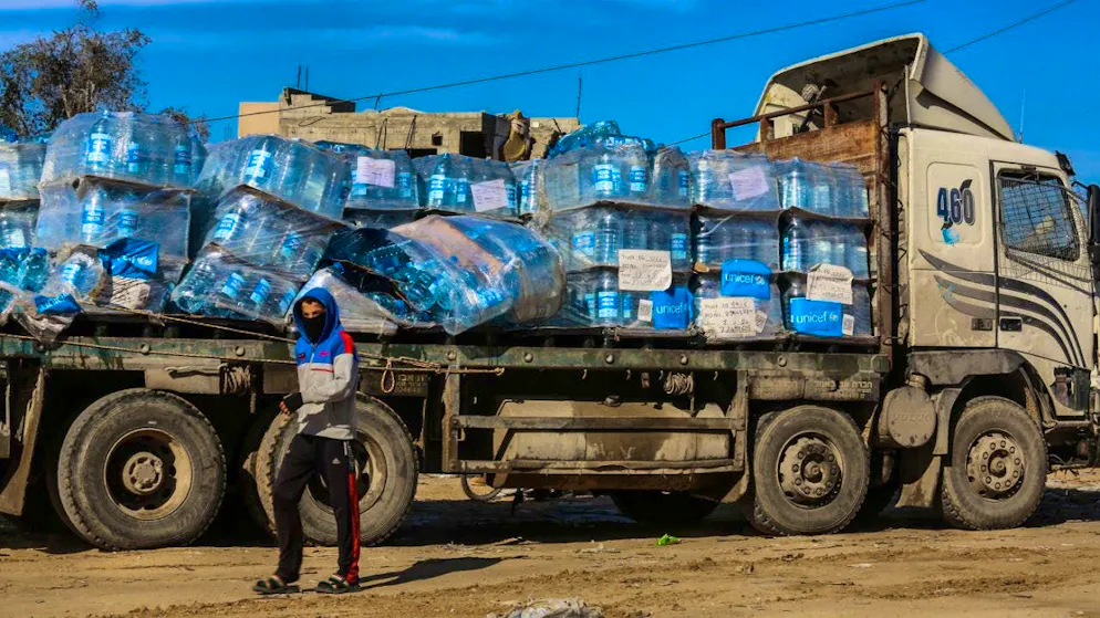 ARCHIVE - Trucks carrying humanitarian aid from the United Nations Relief and Works Agency for Palestine Refugees in the Near East (UNRWA) enter the Gaza Strip at the Kerem Shalom crossing from Egypt, a few days after the ceasefire agreement between Israel and Hamas came into force. Photo: Abed Rahim Khatib/dpa