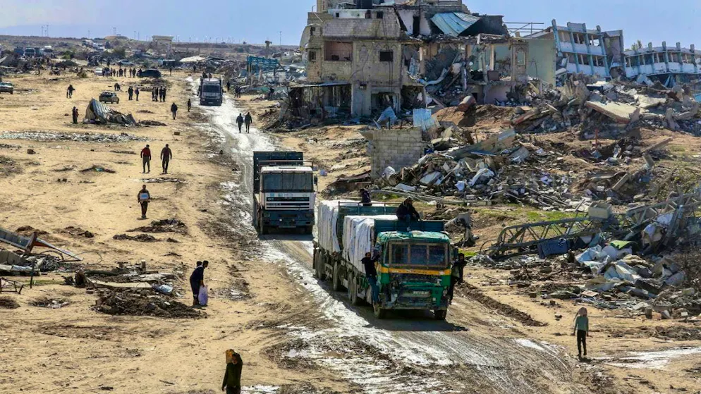 ARCHIVE - Trucks carrying humanitarian aid from the United Nations Relief and Works Agency for Palestine Refugees in the Near East (UNRWA) enter the Gaza Strip at the Kerem Shalom crossing from Egypt, a few days after the ceasefire between Israel and Hamas came into force. Photo: Abed Rahim Khatib/dpa