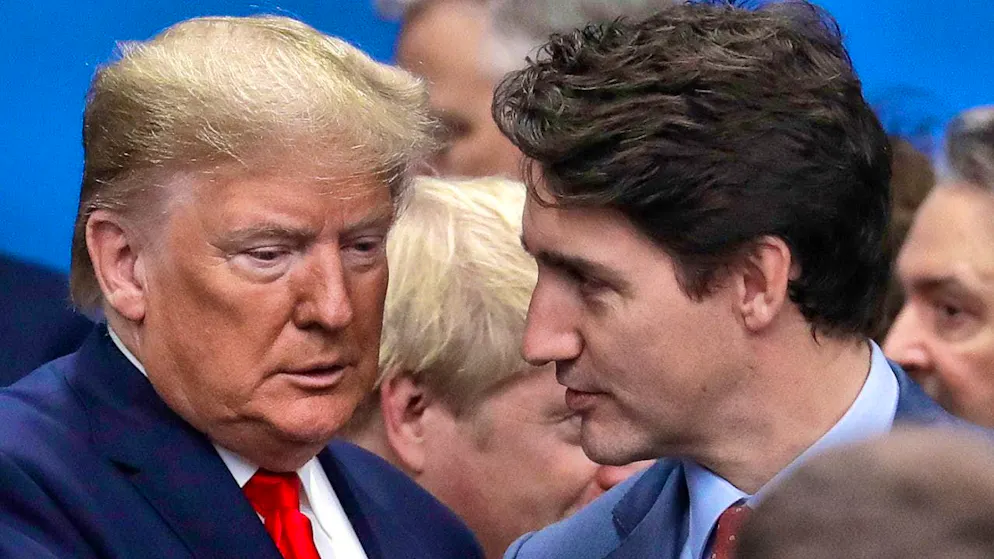 ARCHIVE - US President Donald Trump (l) and Canadian Prime Minister Justin Trudeau shake hands. Photo: Evan Vucci/AP/dpa
