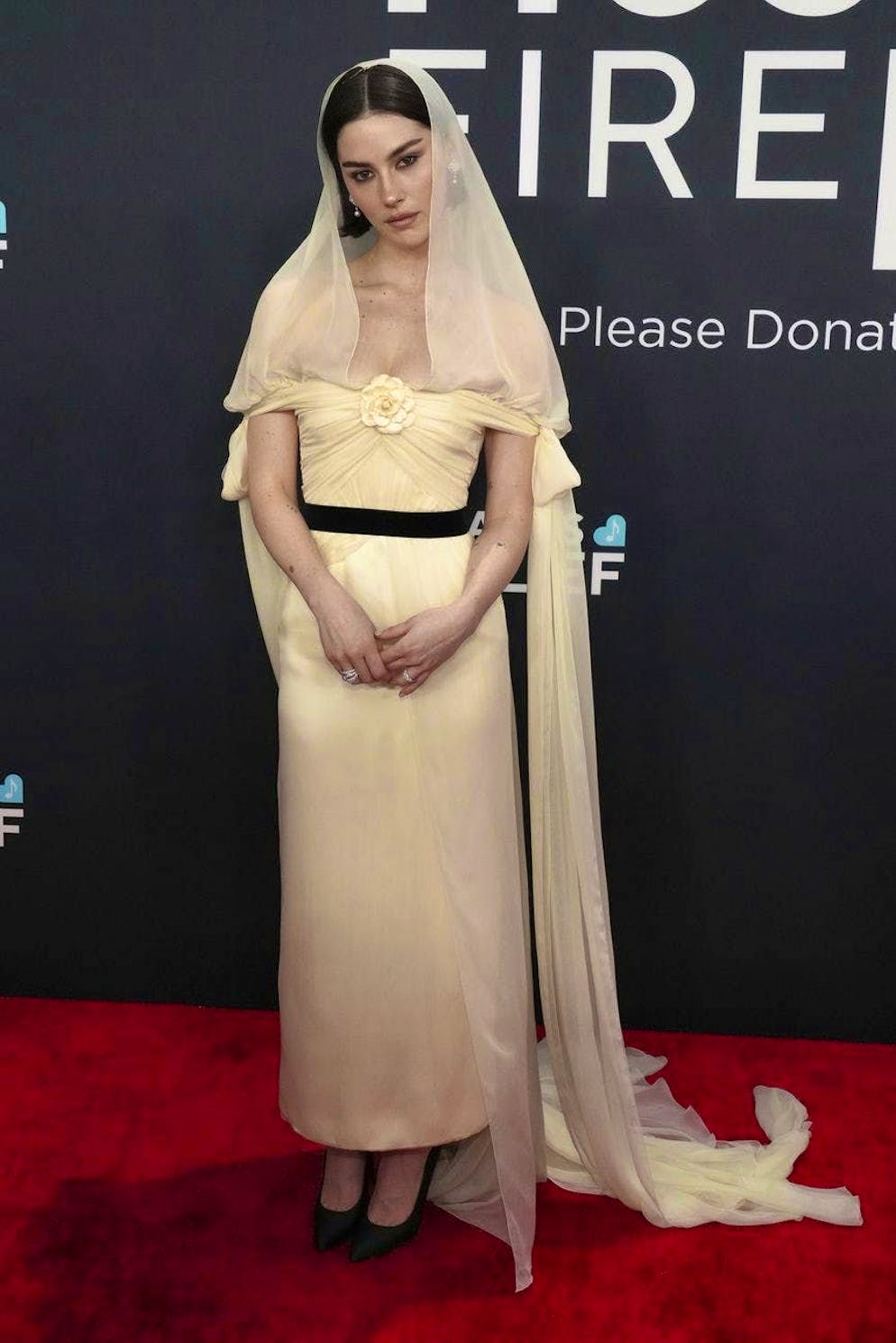 Grammy Awards 2025 - Red Carpet. Gracie Abrams wore a clean wedding-inspired dress by Chanel and is definitely one of the best dressed of the evening.