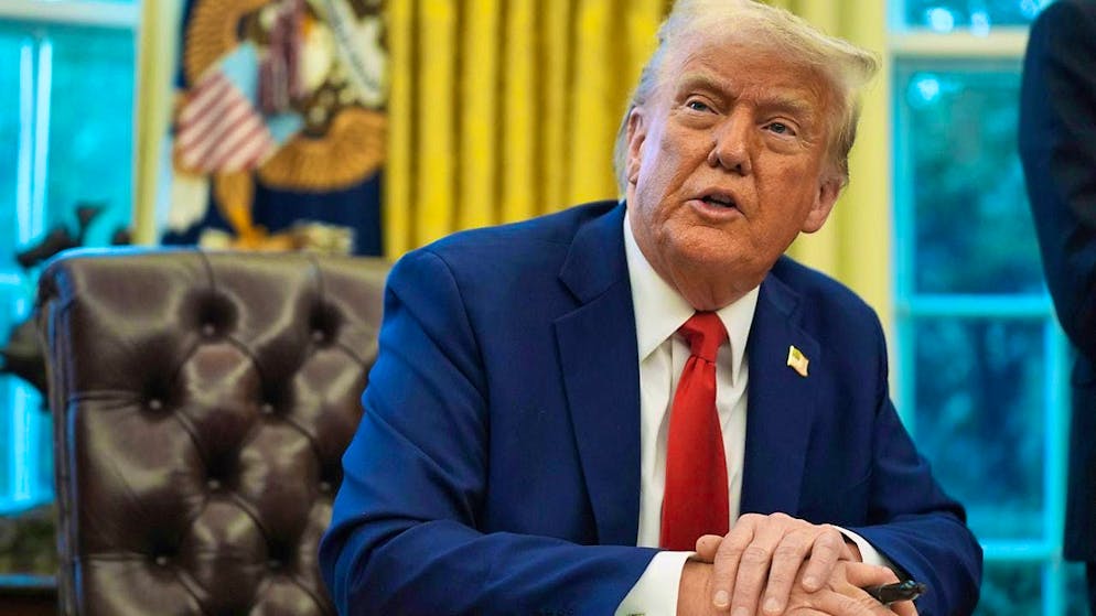 US President Donald Trump speaks before signing an executive order in the Oval Office of the White House in Washington. Photo: Evan Vucci/AP/dpa