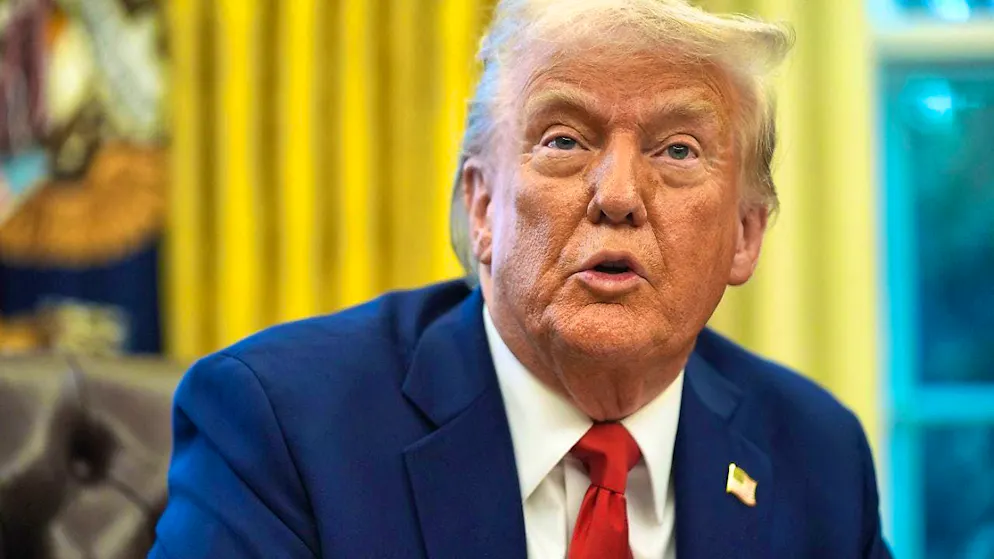 US President Donald Trump speaks before signing an executive order in the Oval Office of the White House in Washington. Photo: Evan Vucci/AP/dpa