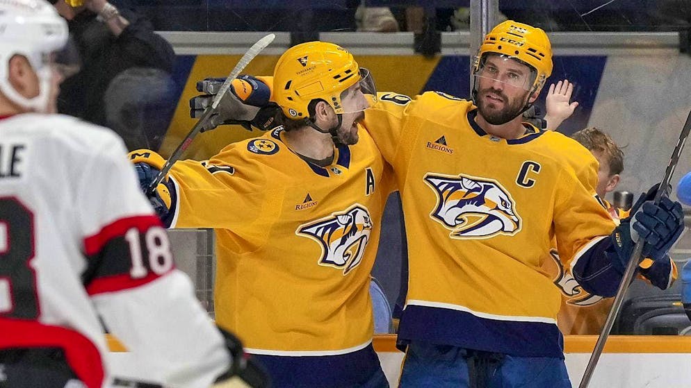 After the 1-0 goal scored by Filip Forsberg (left) on a pass from Roman Josi (right), all was still right with the world for the Nashville Predators