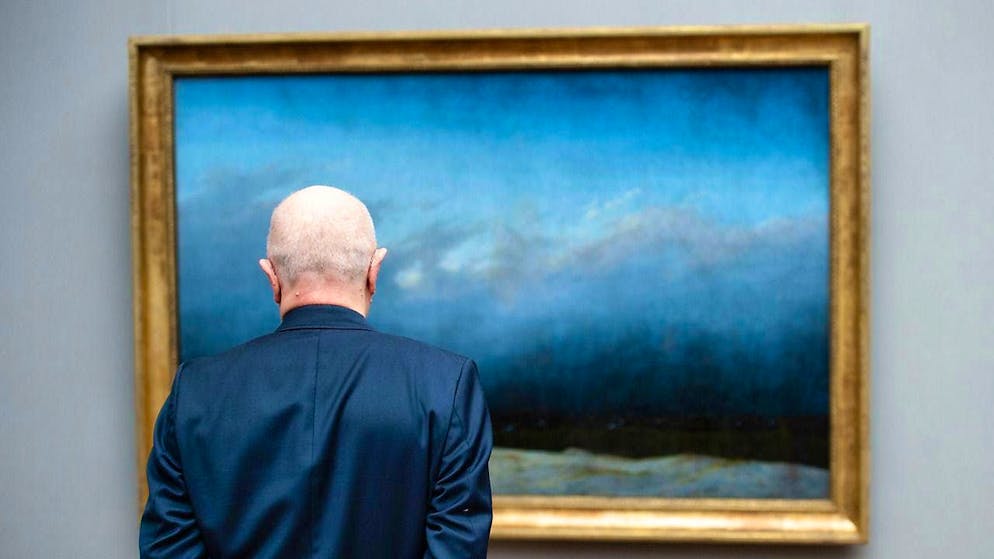 A man stands in front of Caspar David Friedrich's "Monk by the Sea". The Romantic artist's works are now being exhibited on a grand scale in America for the first time. (archive picture)