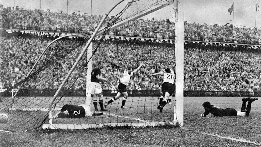 Legendary: Helmut Rahn shoots Germany to the 1954 World Cup title.