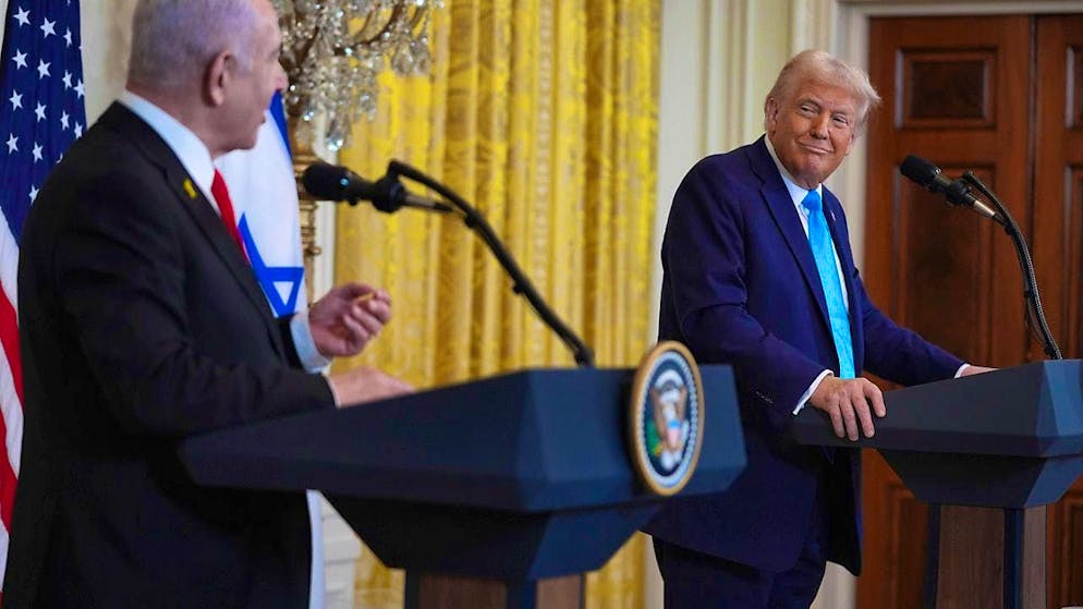 US President Donald Trump (r) and Israeli Prime Minister Benjamin Netanyahu speak during a press conference in the East Room of the White House. Photo: Evan Vucci/AP/dpa