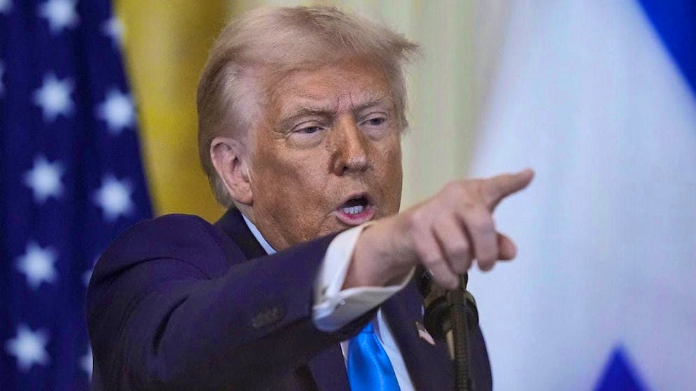 US President Donald Trump answers questions during a press conference with Israeli Prime Minister Netanyahu in the East Room of the White House. Photo: Alex Brandon/AP/dpa