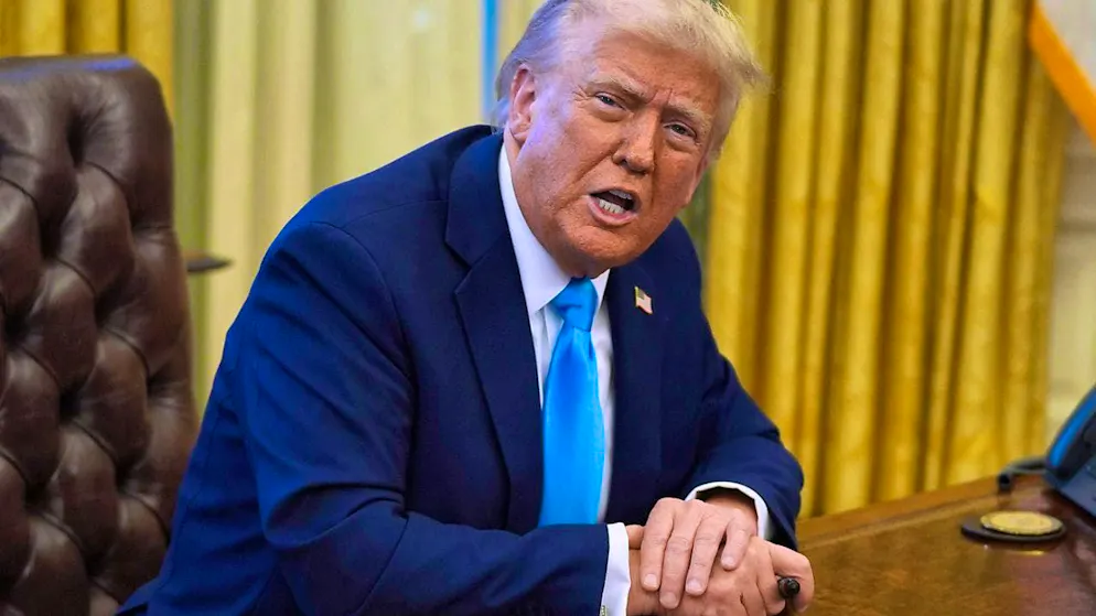 US President Donald Trump speaks to reporters in the Oval Office of the White House. He had just signed the executive order to withdraw from the United Nations Human Rights Council. Photo: Evan Vucci/AP/dpa
